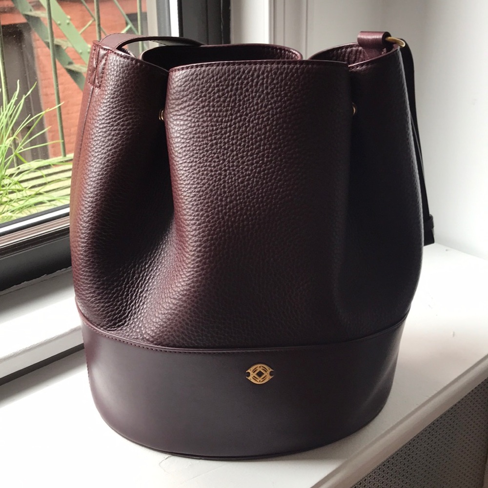 Dagne dover Ava bucket bag in eggplant / burgundy